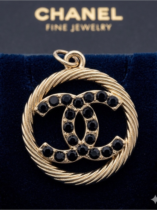 Chanel. Jewelry - ChaneI Silver -Tone Pendant with Black Crystal Interlocking C